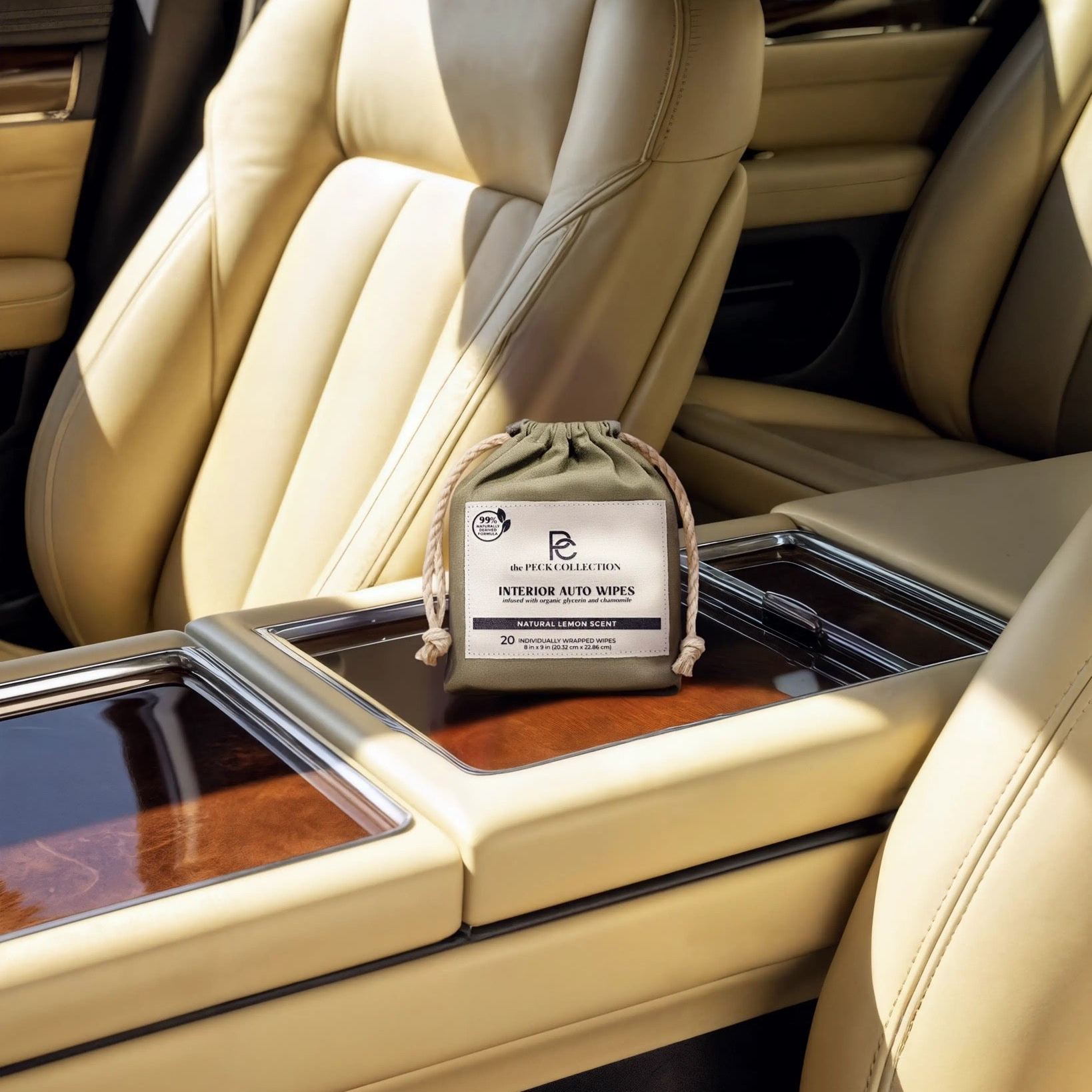 natural interior auto wipes cotton bag on car console in a luxury interior